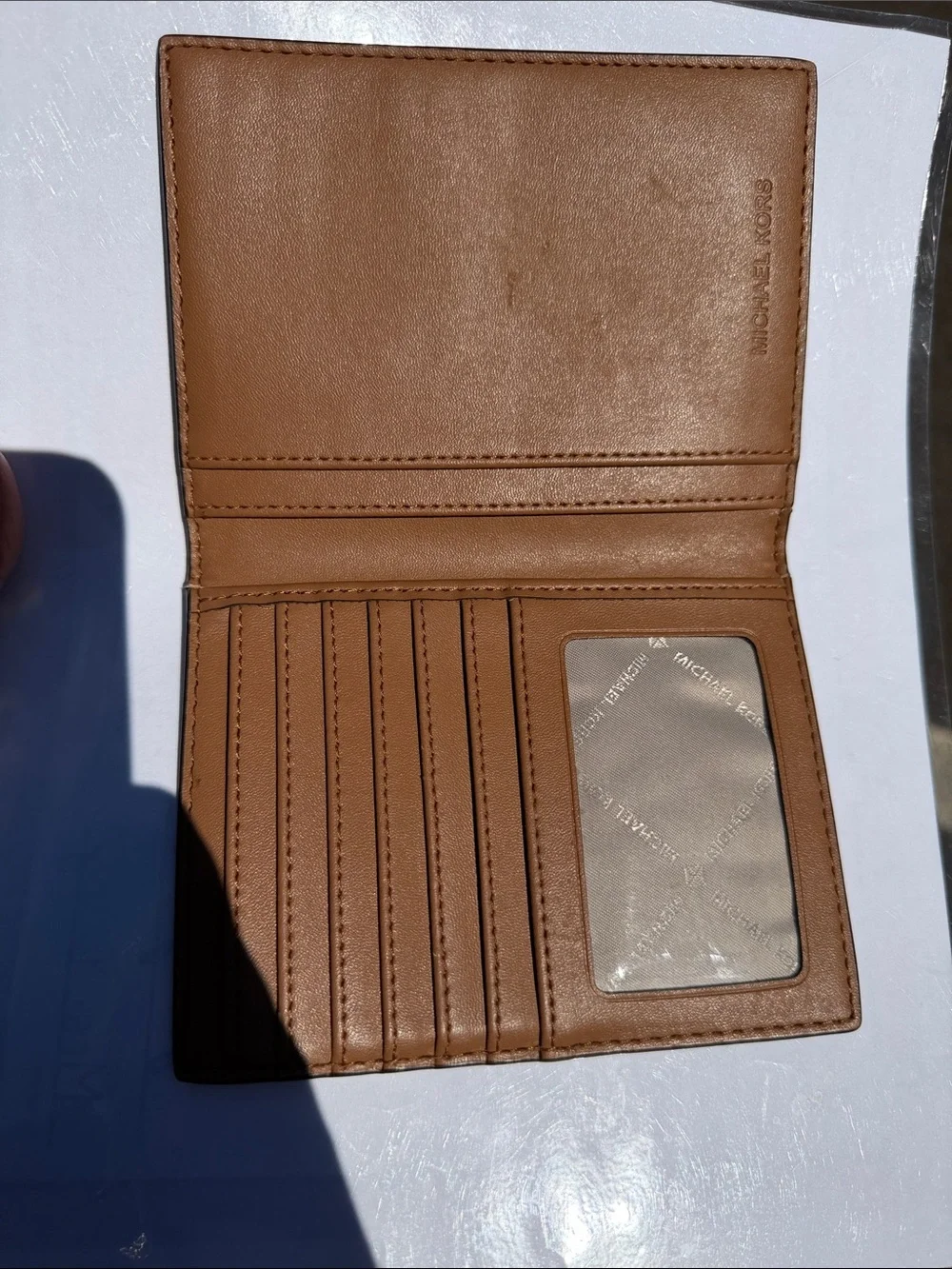 Michael Kors Brown Monogram Passport Cover with Gold Logo